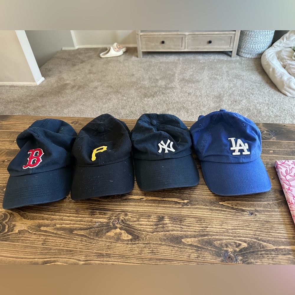 Four MLB baseball caps